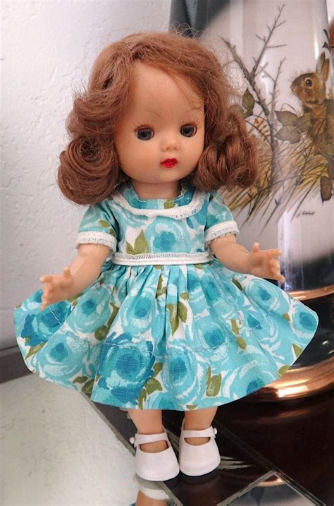 NASB Nancy Ann Storybook Muffie Brunette SLW DOLL In Blue Floral Dress