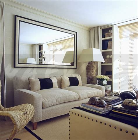 Image Large Mirror Above White Sofa With Blackcream Cushions In