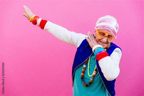 Funny grandmother portraits. 80s style outfit. Dab dance on colored ...