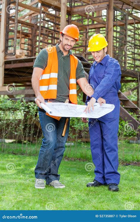 Confident Architect With Colleague Explaining Stock Image Image Of