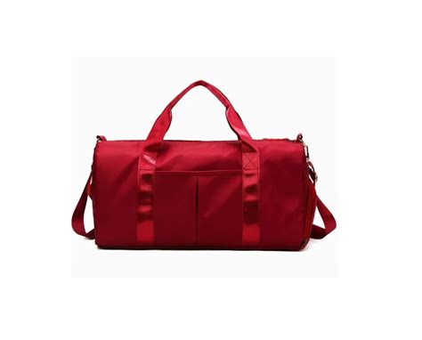 Ripley BOLSO PARA VIAJES HOMBRES Y MUJERES ROJO