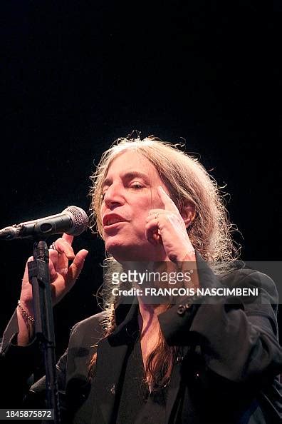 Us Rock Singer And Poet Patti Smith Gestures As She Performs On Stage