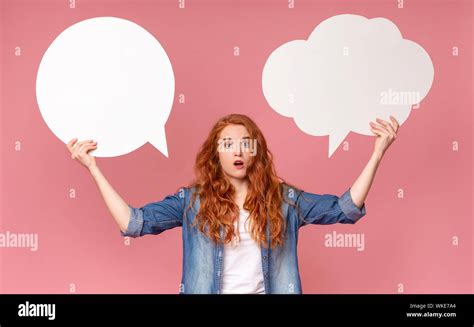 Redhead Girl Holding Two Speech Bubbles Having Complex Choice Stock