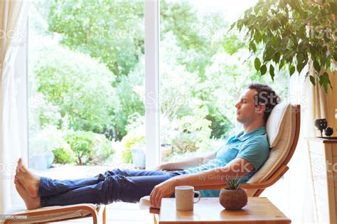 Man Relaxing At Home After Work Sleep And Having Rest On Weekend Stock