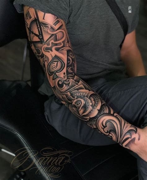 A Man With A Tattoo On His Arm