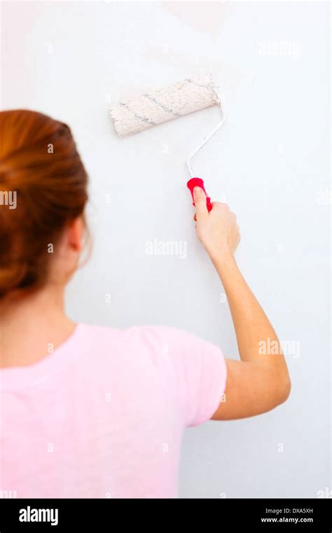 Woman Painting Wall Paint Brush Hi Res Stock Photography And Images Alamy