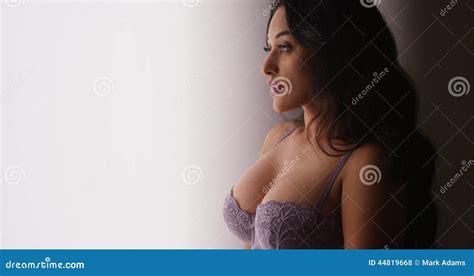 Mexican Woman Standing By Window In Lingerie Stock Photo Image Of