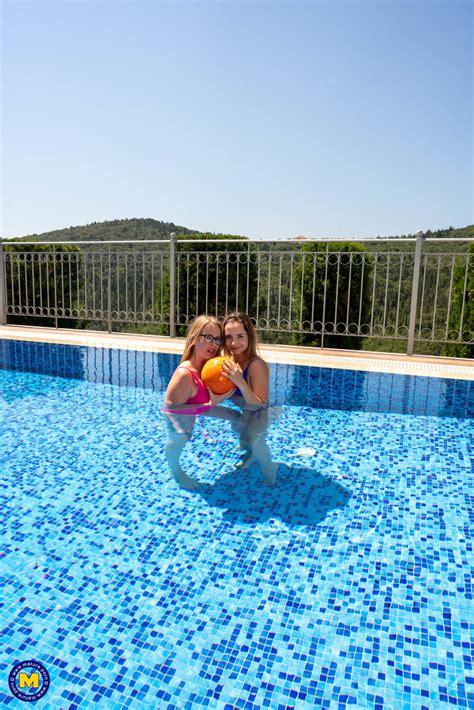 MILF Mackenzie Page And Horny Teen Mona Blue Suck Each Other S Muff Poolside CoedCherry