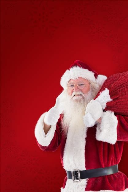 Premium Photo Santa Likes To Carry His Sack Against Red Background