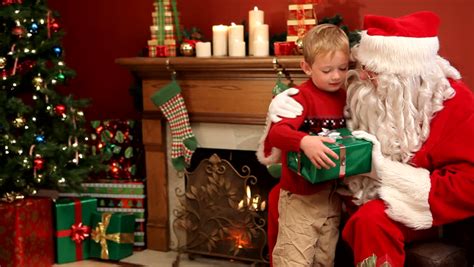 Santa Claus Giving Gift To Boy Stock Footage Video 4551641 - Shutterstock