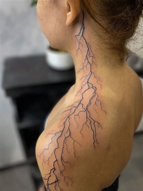 Lightning Tattoo On Woman S Neck