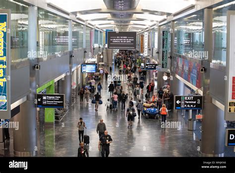 Passengers In Concourse D Of Miami International Airport Miami