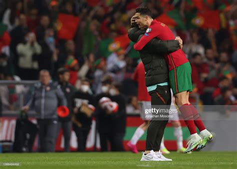 Diogo Dalot Of Portugal Lifts Team Mate Cristiano Ronaldo As The Team