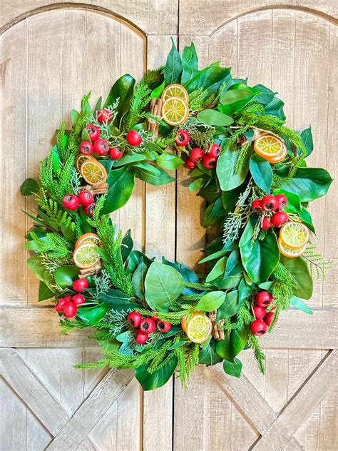 Christmas Wreath With Orange Slices Red Berries Magnolia Leaves ...