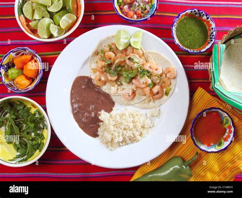 Shrimp Tacos Rice And Frijoles Chili Sauces Mexican Seafood Stock Photo
