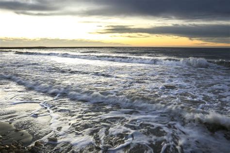 Spectacular And Colorful Sunrise On The Beach Stock Photo Image Of