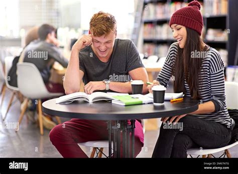 Doing Some Exam Prep With A Friend Two College Students Studying