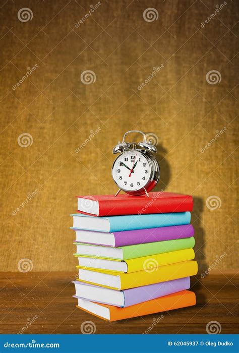 Exam Time stock image. Image of alarm, textbook, shot - 62045937