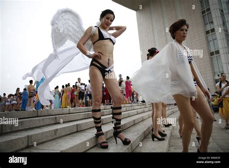 Elderly Chinese Women Dressed In Bikini Take Part In A Middle Aged And