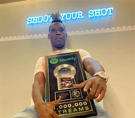 Ajdaguru Receives Plaque For Surpassing One Million Spotify Streams