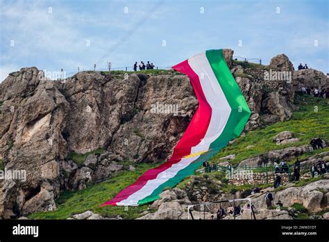 Iraqi Kurds Hold A Huge Kurdistan Flag As They Celebrate Nowruz Day A