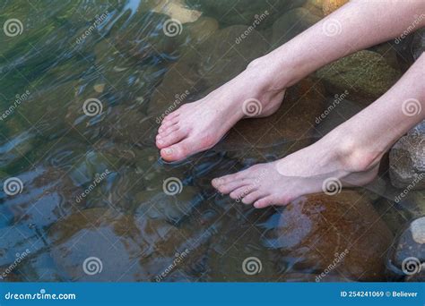 Teenage Girl Put Her Bare Feet Into A Mountain Stream Summer Hot Day Stock Image Image Of