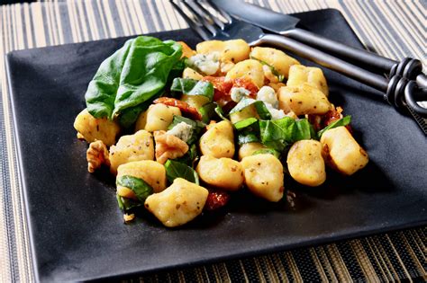 Pan Seared Gnocchi Gorgonzola Sun Dried Tomatoes Basil And Walnuts