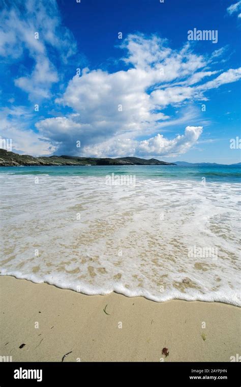 Surf Sand And Blue Sky At The Beautiful Remote And Deserted Sandy