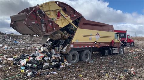 Unloading A Garbage Truck At The Dump Youtube