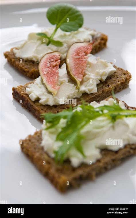 Pumpernickel Rye Bread Canapes On A White Plate Stock Photo Alamy