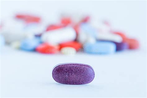 Close Up Of Purple Medicine Pill Stock Photo Image Of Health