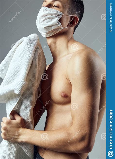Muscular Man With Naked Torso Medical Mask Towels In Hands Close Up Stock Photo Image Of