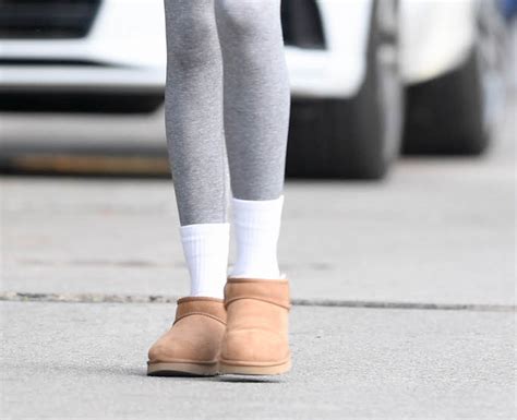 Kaia Gerber Wears Gray Leggings With Ugg Mini Boots For Pilates