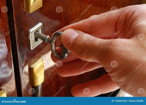 The key in the lock stock photo. Image of unlocking - 132487646