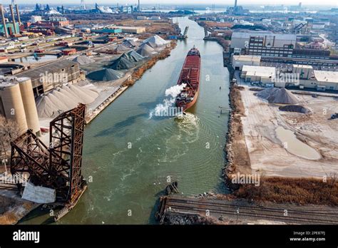 A Bulk Cargo Freighter Travels The Rouge River Towards The Detroit