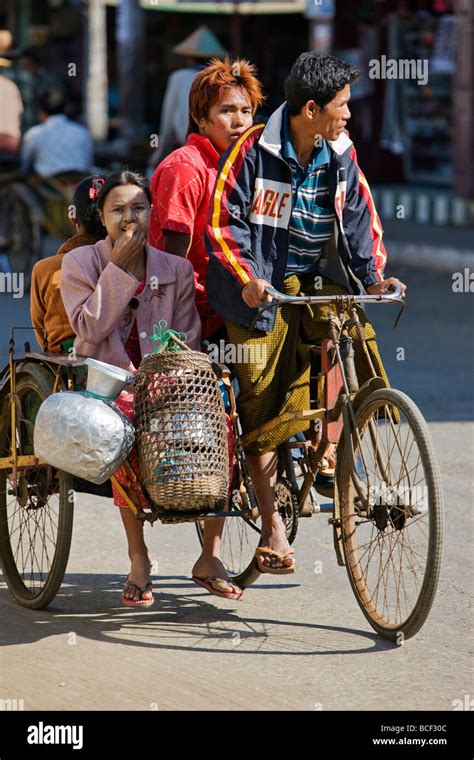 Indian Cycle Rickshaw Wala Taking Time Out In Puri India Stock Photo