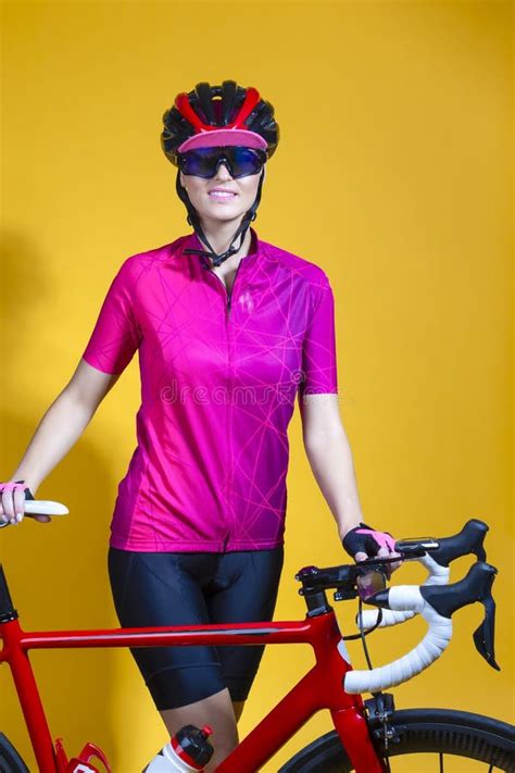 One Winsome Female Road Cyclist Posing with Modern Carbon Race Bike in ...