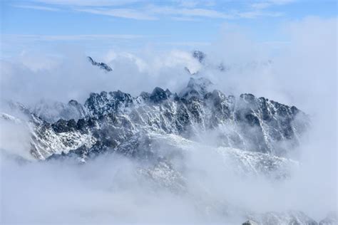 Mist covered mountains stock image. Image of water, wave - 102719213