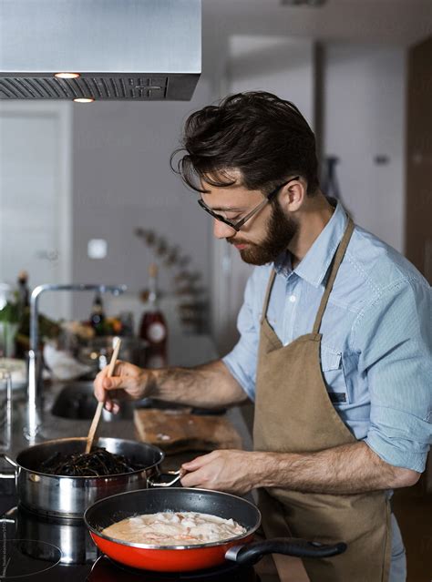 Man Cooking At Home