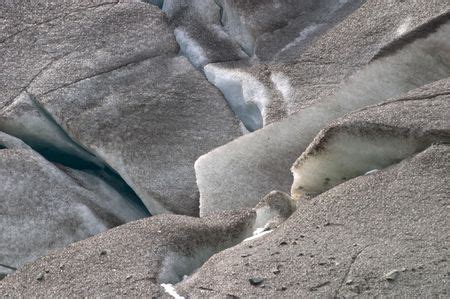 Black Ice Crevasse On Rhone Glacier On Furka Pass Alps Valais