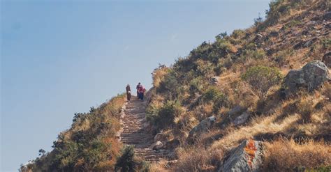Low Angle Shot Of People Walking Uphill · Free Stock Photo