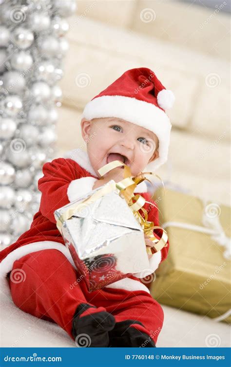 Baby In Santa Costume At Christmas Stock Photo Image Of T Cute