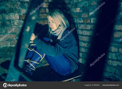Blonde Girl Her Hands Feet Tied Sitting Basement Concept Kidnapping Stock Photo Erik
