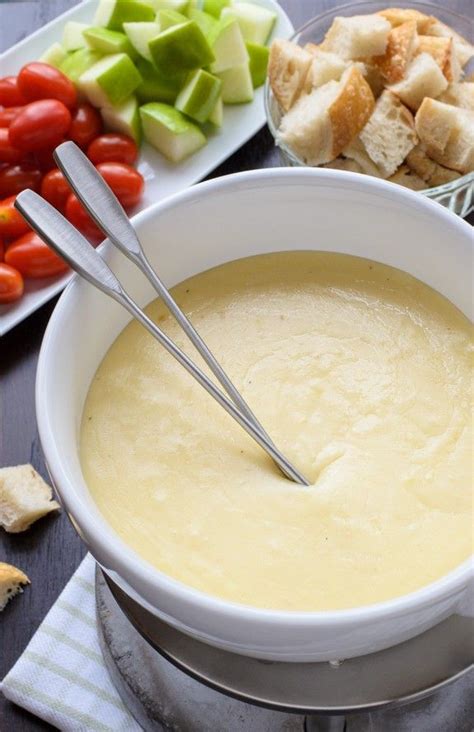 The best cheese fondue recipe. So easy and your friends will be totally ...