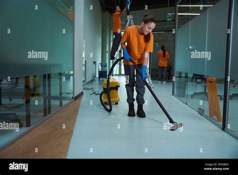 cleaning company workers washing  cleansing  building stock photo