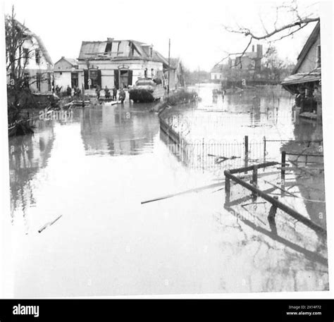 SPECIAL FOR KEMSLEY NEWSPAPERS LTD SHEFFIELD - Scenes in the flooded front line village of ...