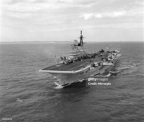 Royal Navy Aircraft Carrier Hms Victorious Steams Through The Solent