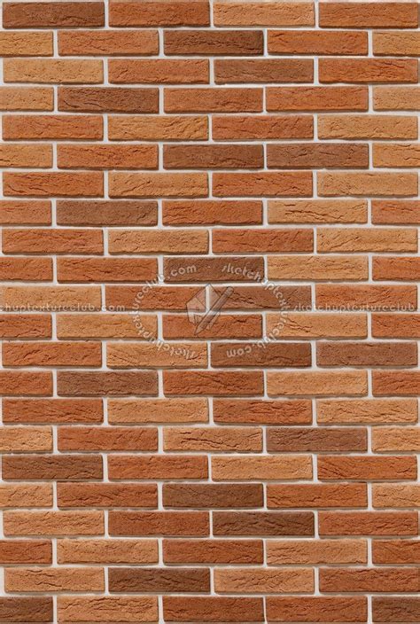 A Brick Wall Made Out Of Red And Brown Bricks