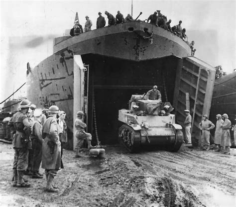 French Troops Watch M5 Stuart Tank Back Into LST-394 In North Africa 1943 | World War Photos