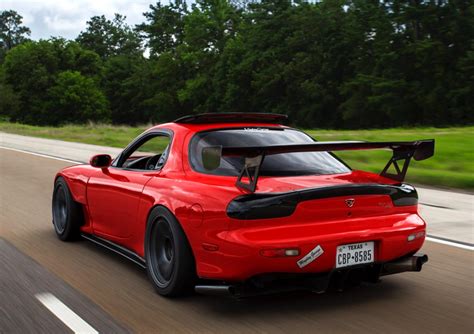 Red Mazda Rx7 On A Texas Road Autos